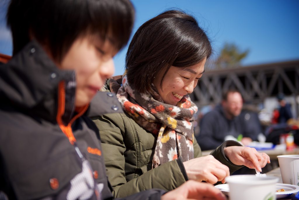 mother and child eating pancakes