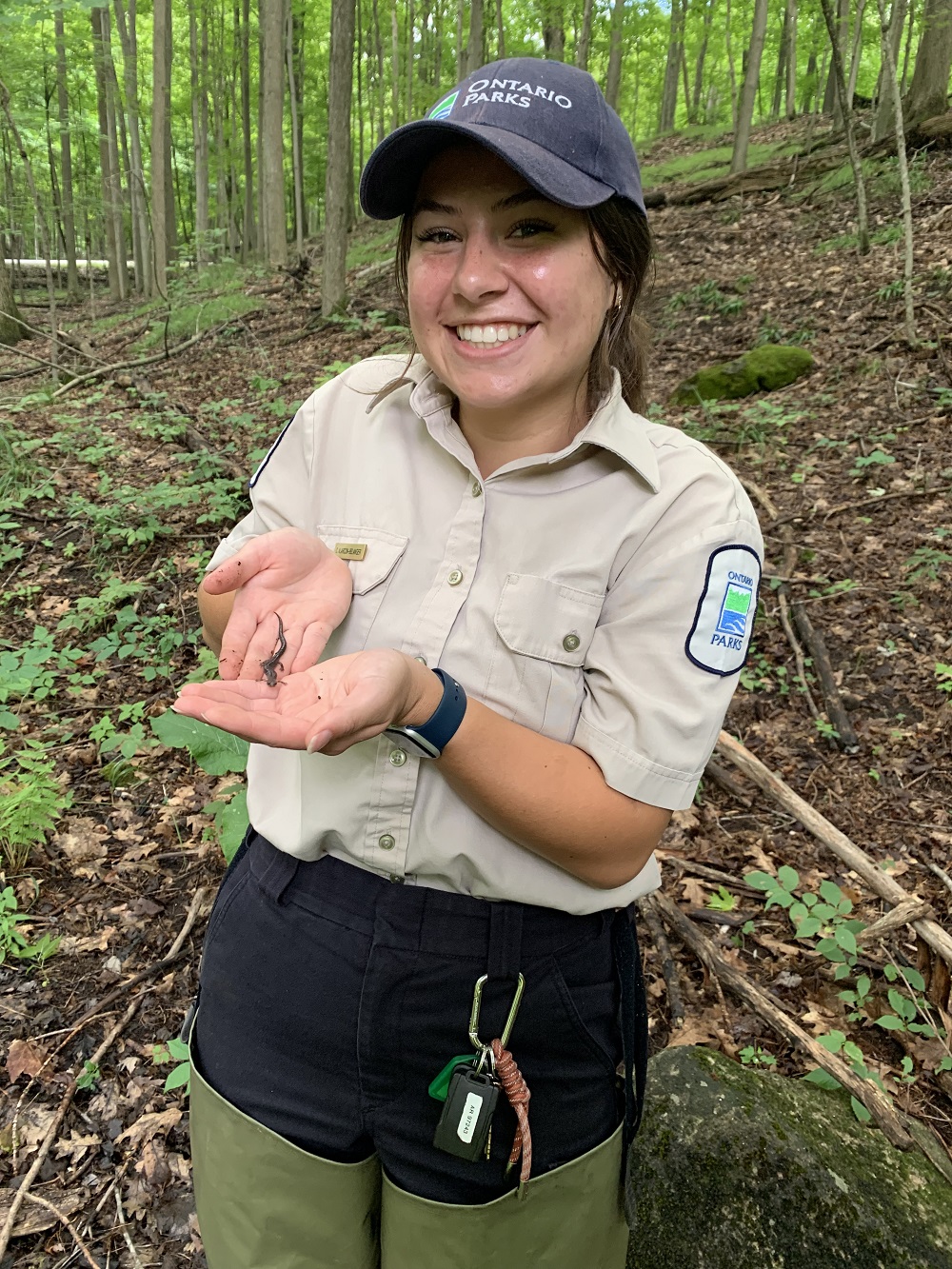 staff holding salamander