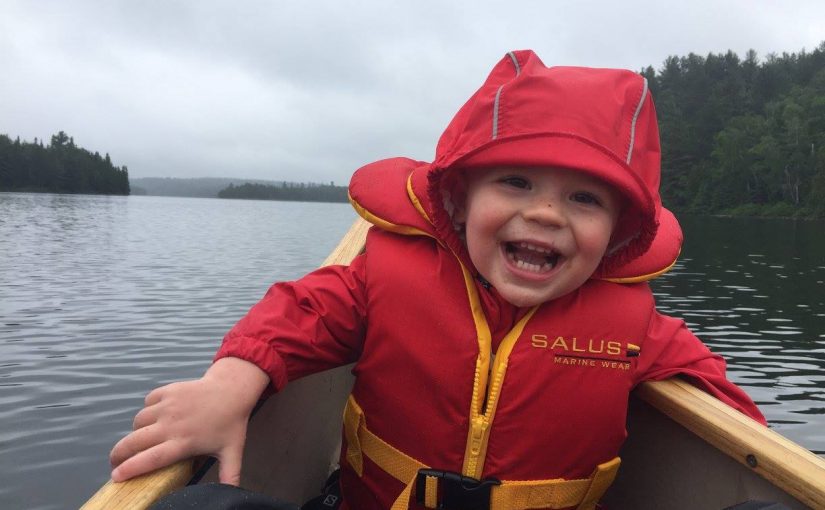 child in canoe