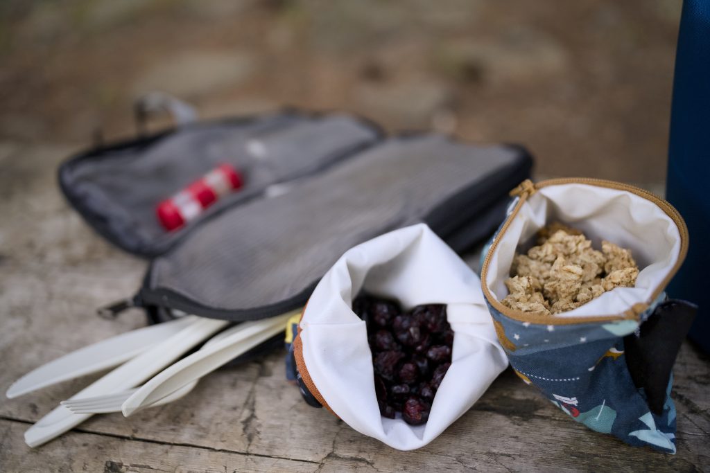 Reusable bags with snacks and cutlery