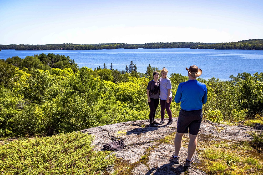 group posing for photo at lookout