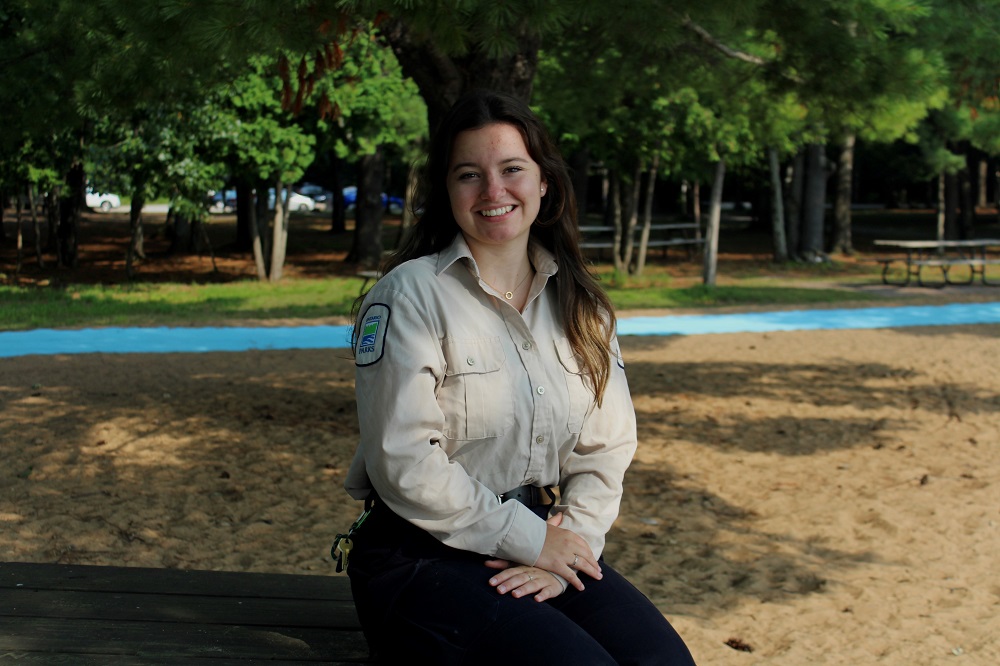 staff sitting with arms crossed