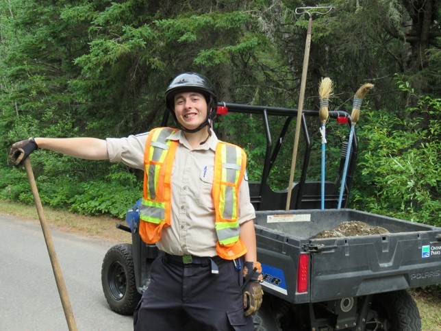 maintenance staff holding shovel