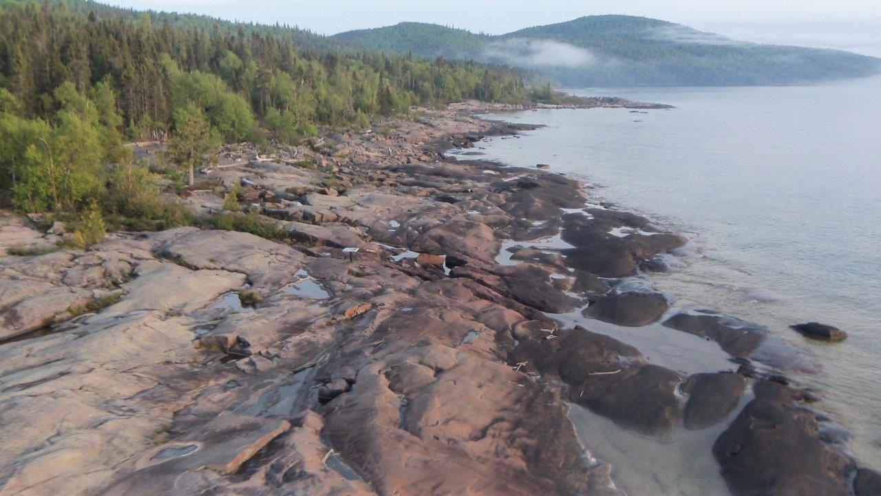 Rocky shoreline on a misty day