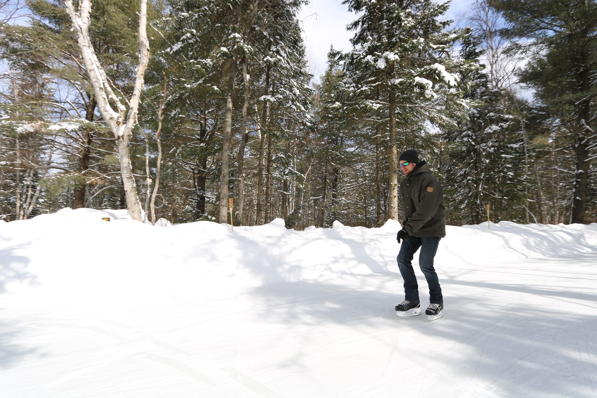 person skating on ice trail