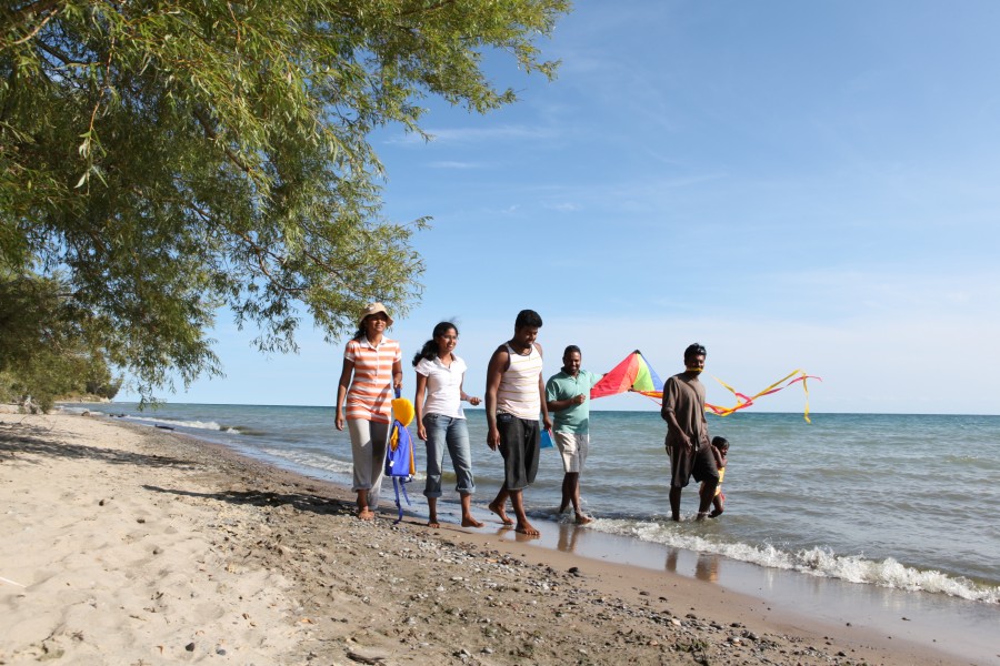 family with kite on Darlington beach