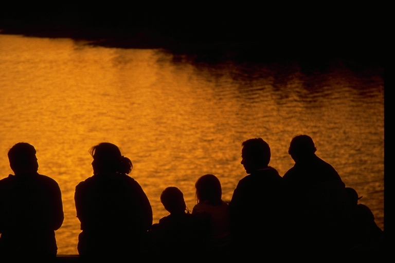 silhouettes by lake