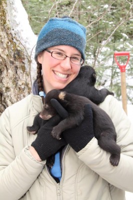 Meg holding bear cubs