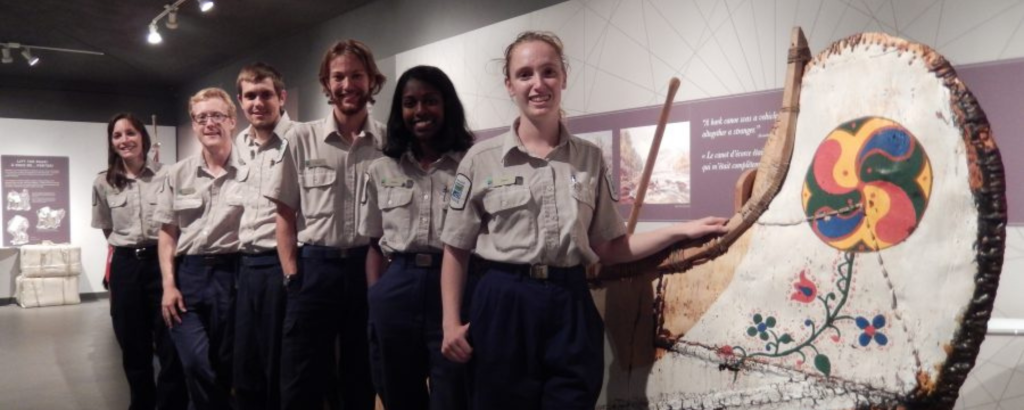 NHE staff with canoe