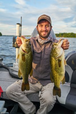 angler holding bass