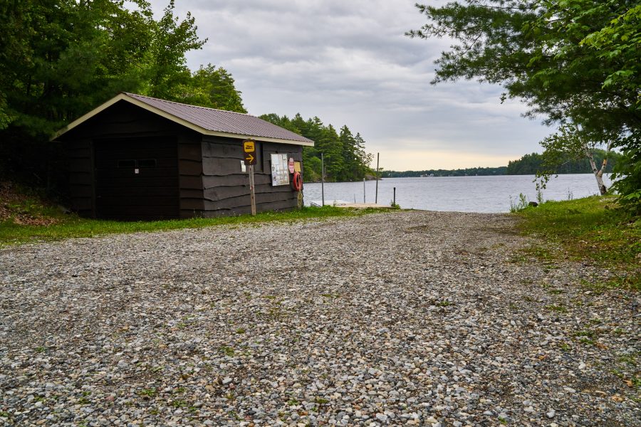 Gravel road leading to view of Sharbot Lake. 