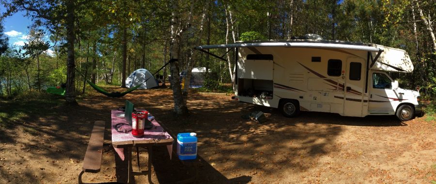 waterfront campsite Panorama with RV