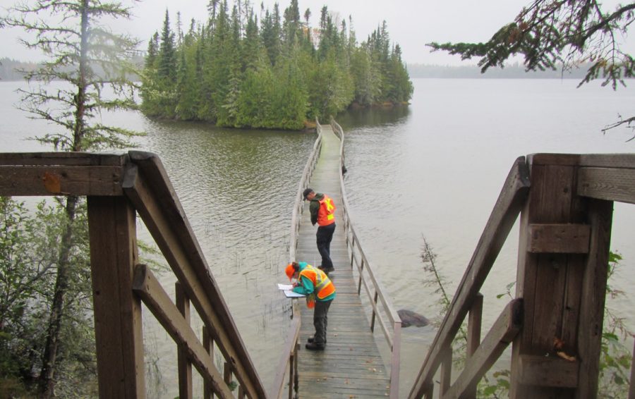 Crew performs boardwalk maintenance