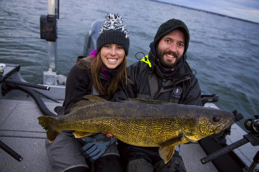 Couple holds massive walleye