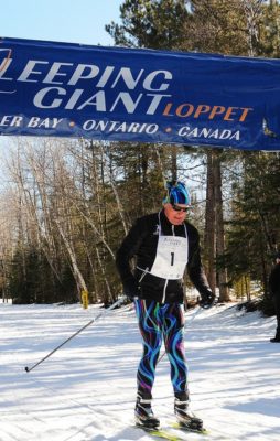 Man skies across finish line