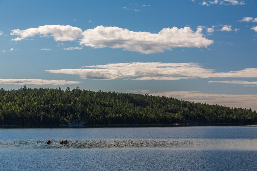 scenic shot of canoers in the backcountry