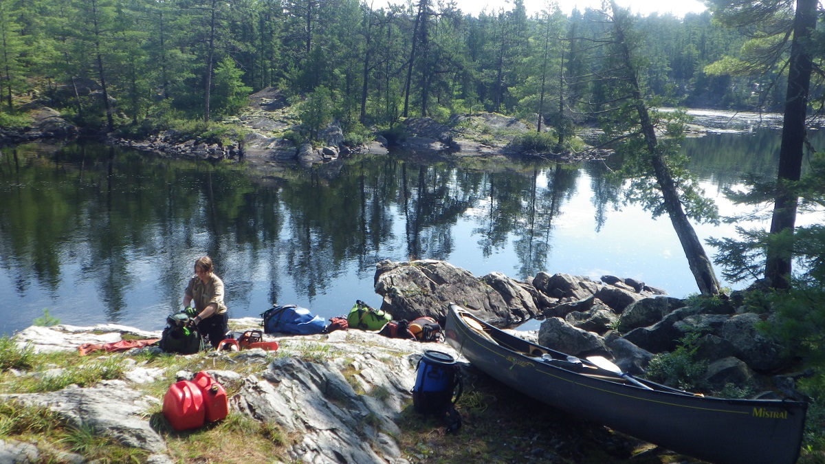 Bags scattered on a rock shore 