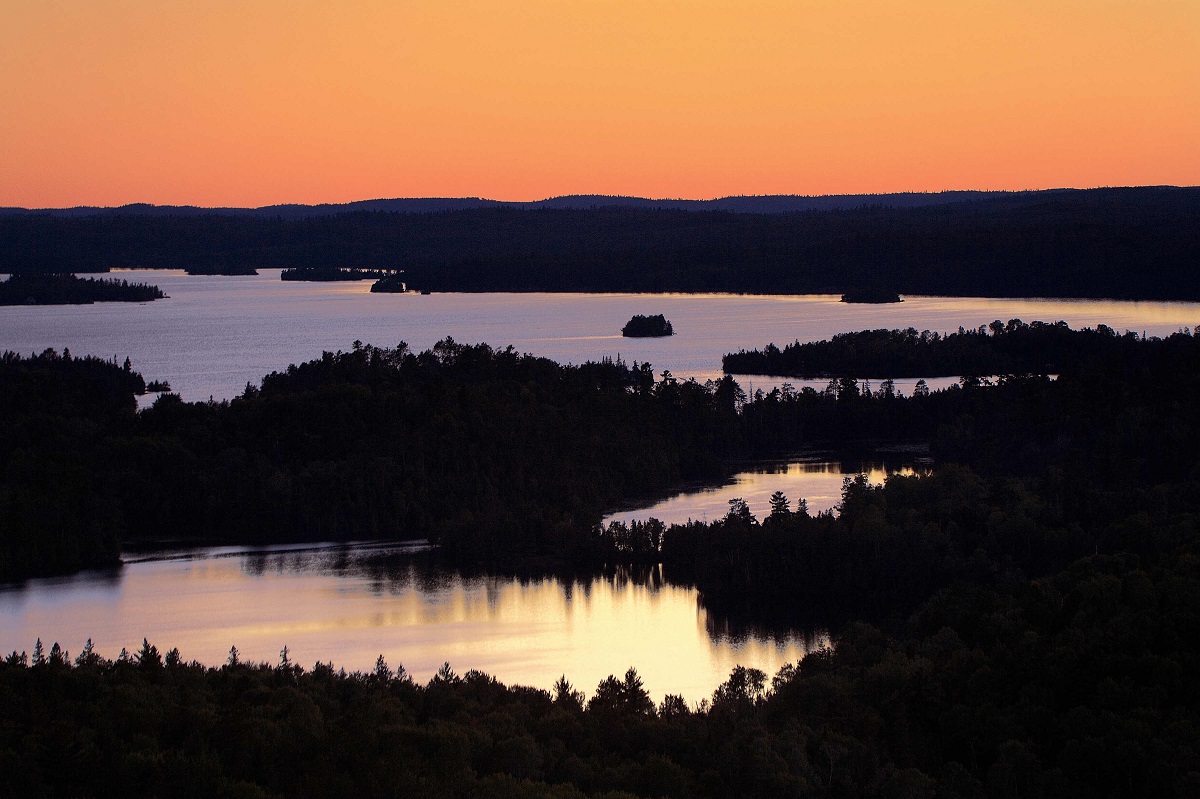 Forest and lakes at sunset