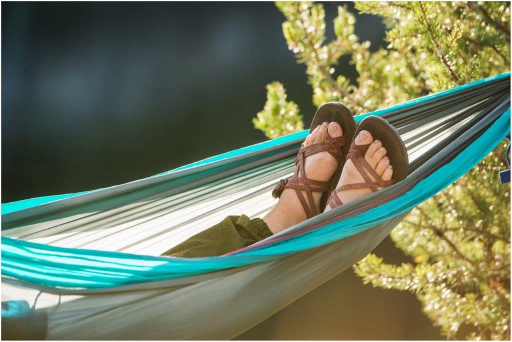 View of feet coming out of a hammock