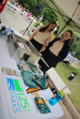 park rangers at time capsule table