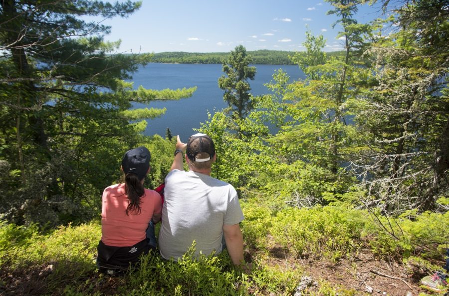 Couple looking out at the Wakami Lake