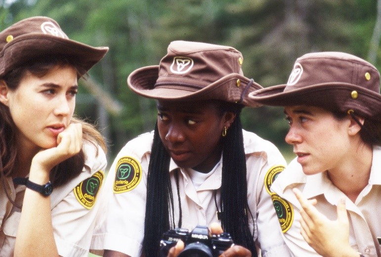 Three young women having a discussion