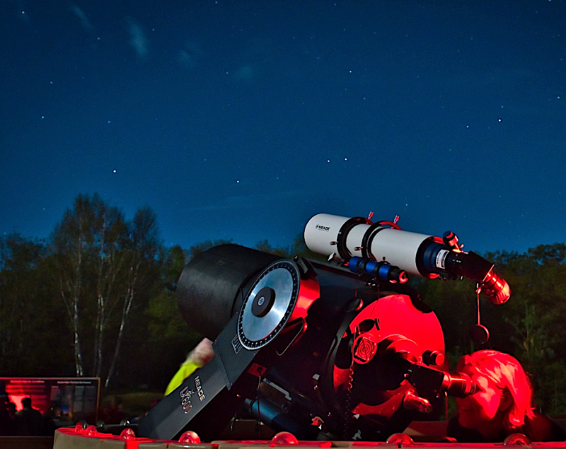 telescope aimed at night sky