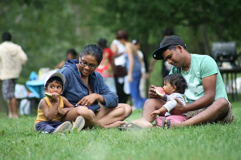 Family eating watermelon