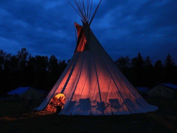 Lighted shelter at night