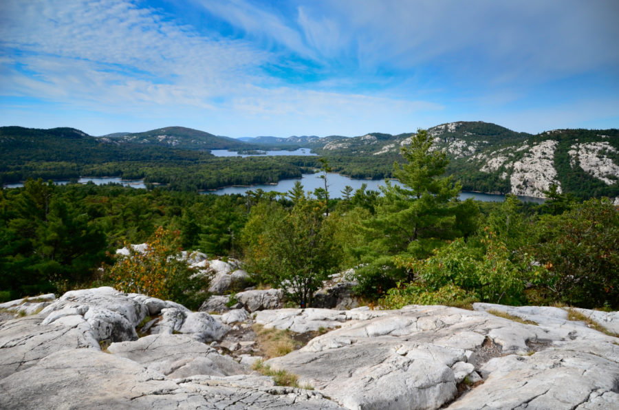 View of the white quartzite hills and lakes at the top of The Crack Trail.