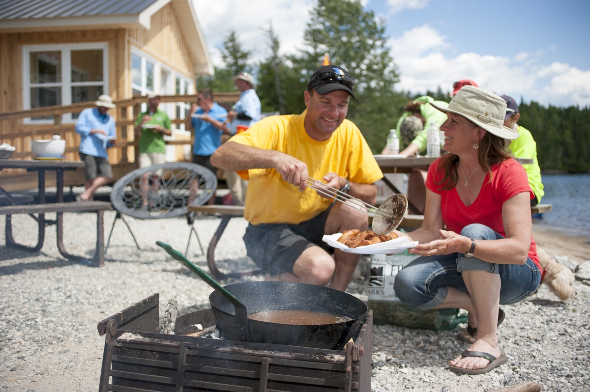 shore lunch in front of cabin