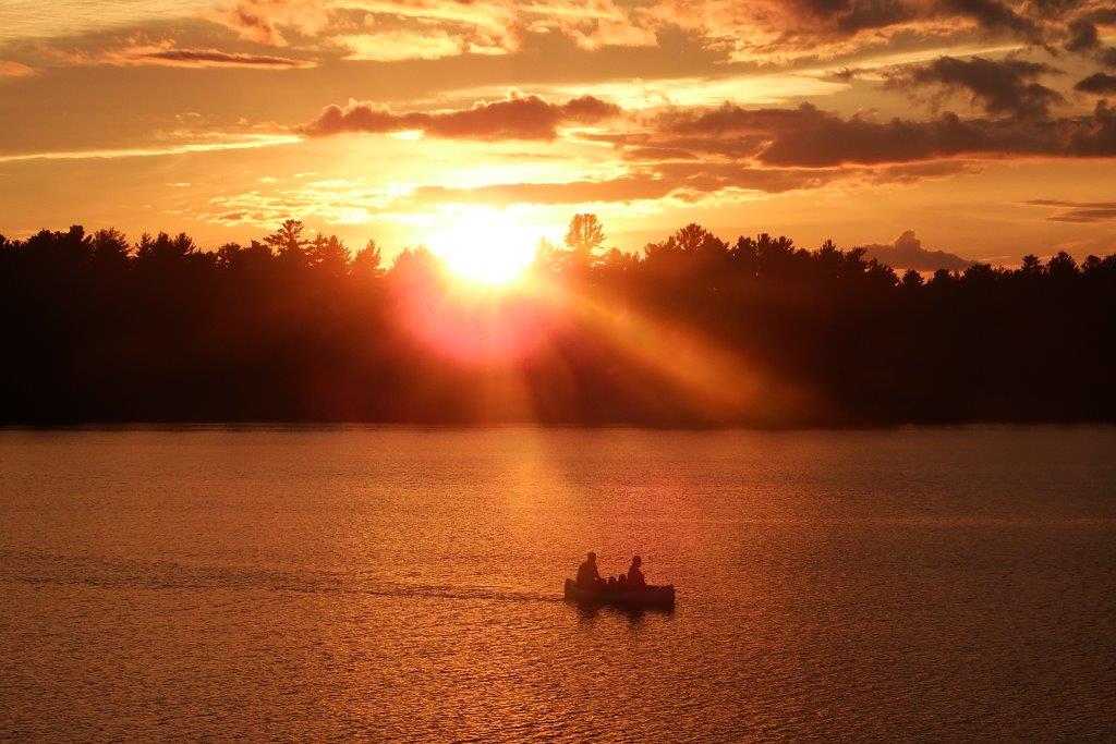 Canoeing into sunset,