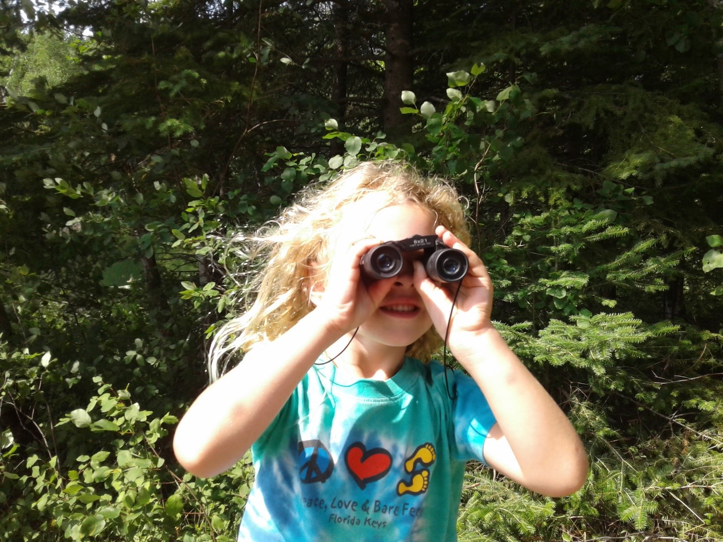 child with binoculars