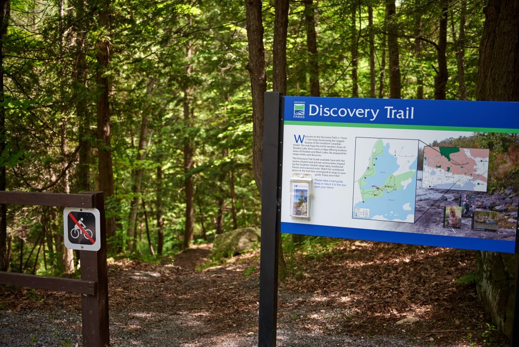 Discovery Trail sign at entrance to forest