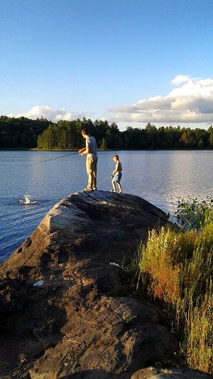 father and child fishing