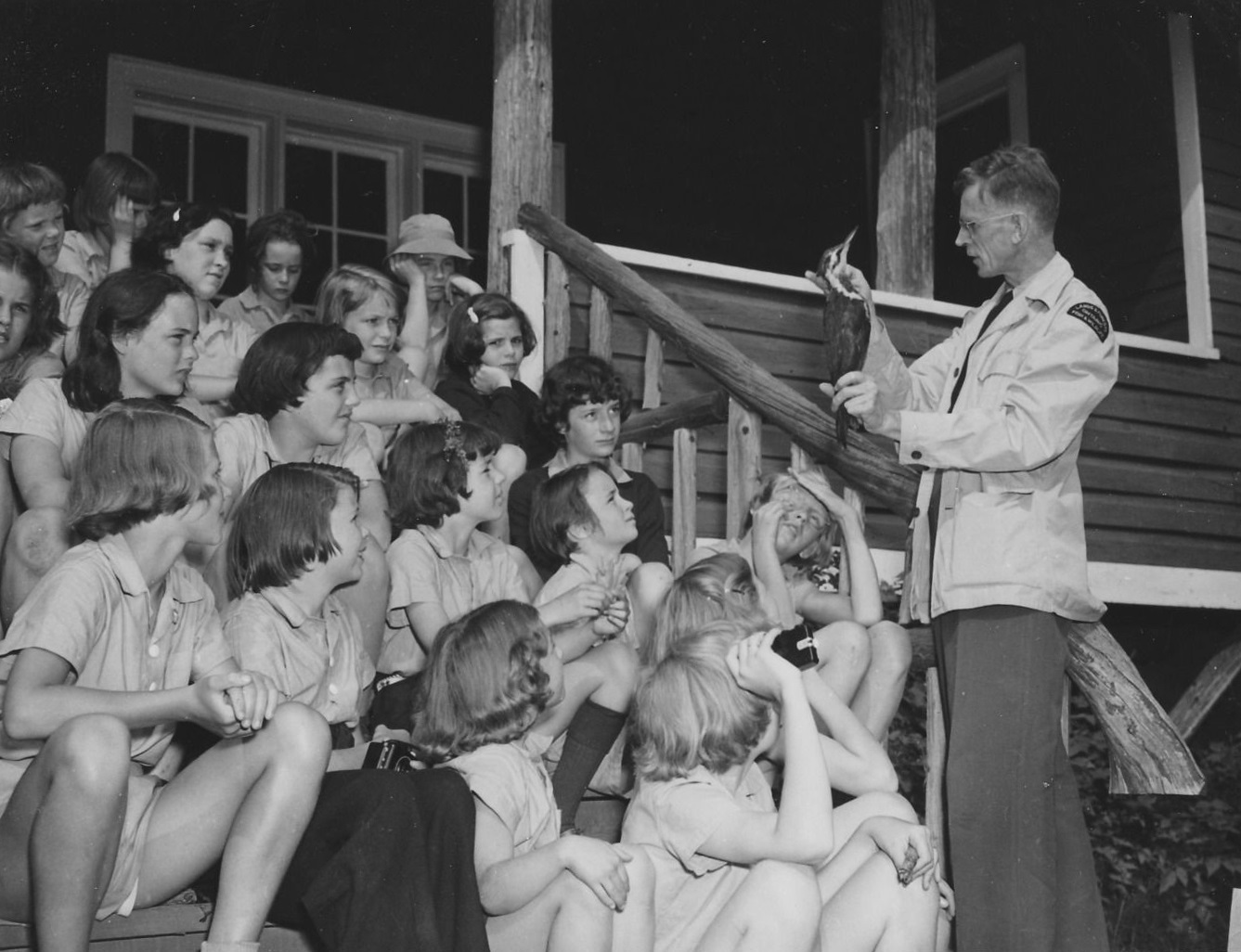 staff with large group of children