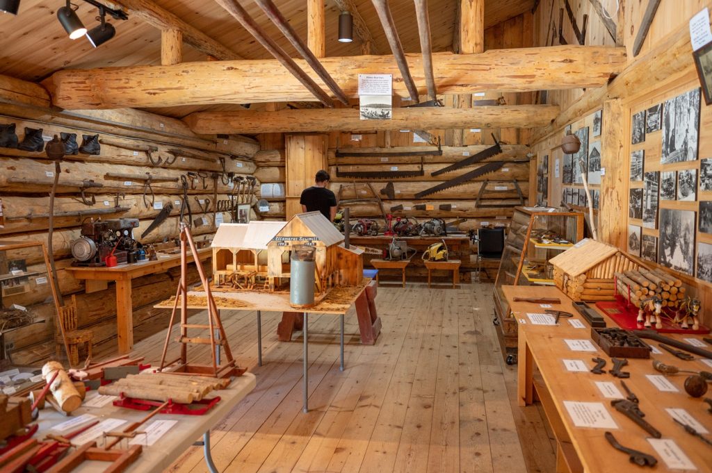 Artifacts inside main cabin at logging museum