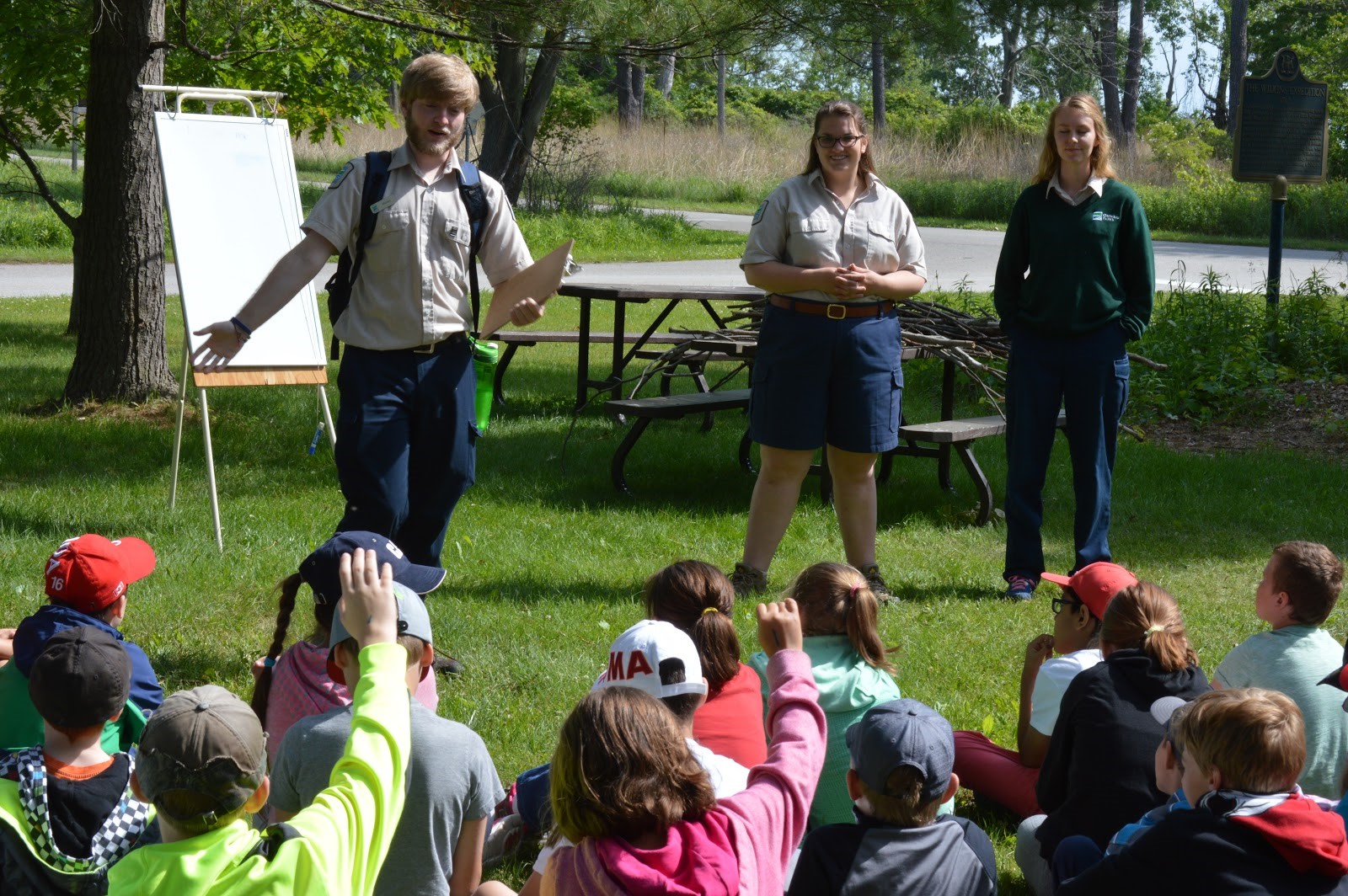 Discovery leaders presenting in front of kids