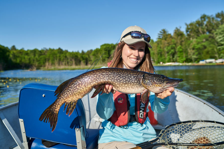 Ashley holding a northern pike.