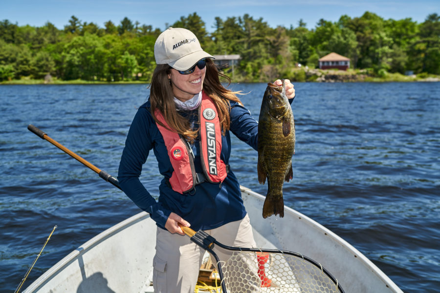 Ashley holding a Bass.