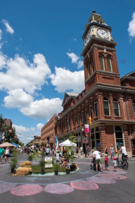 Downtown Peterborough during PTBO Pulse with Maket Hall in the background.