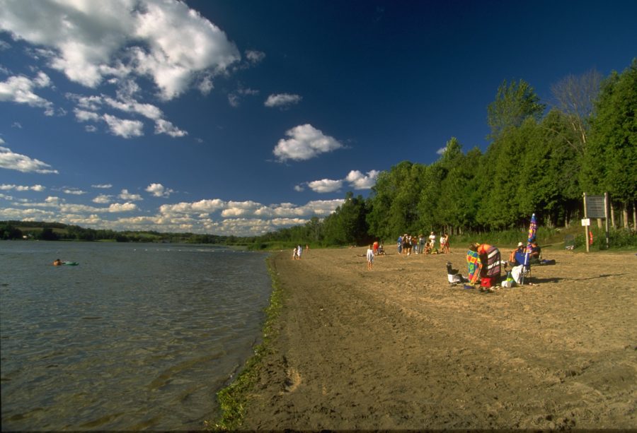 Visitors enjoying day on the beach.