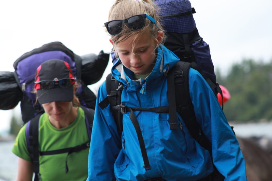 Mother and daughter hiking.