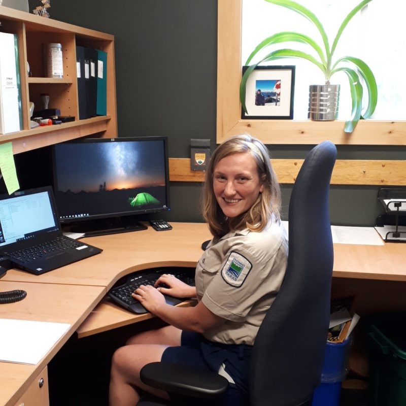 ranger sitting at computer desk