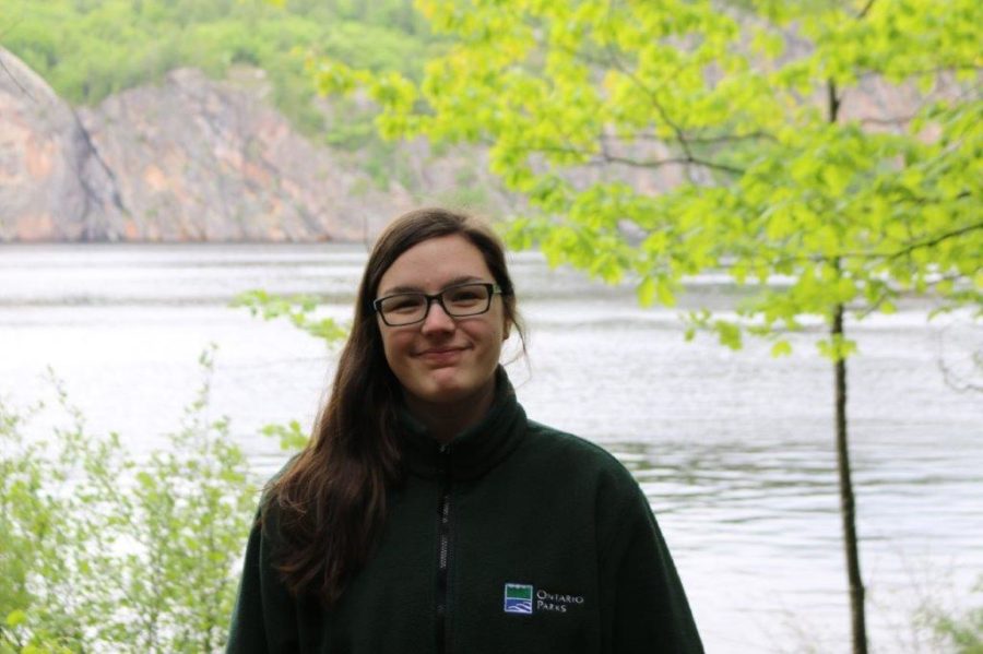 staff in from of Mazinaw Lake