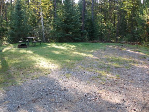 View of site 2 shows a nice parking spur with lots of grass on site.