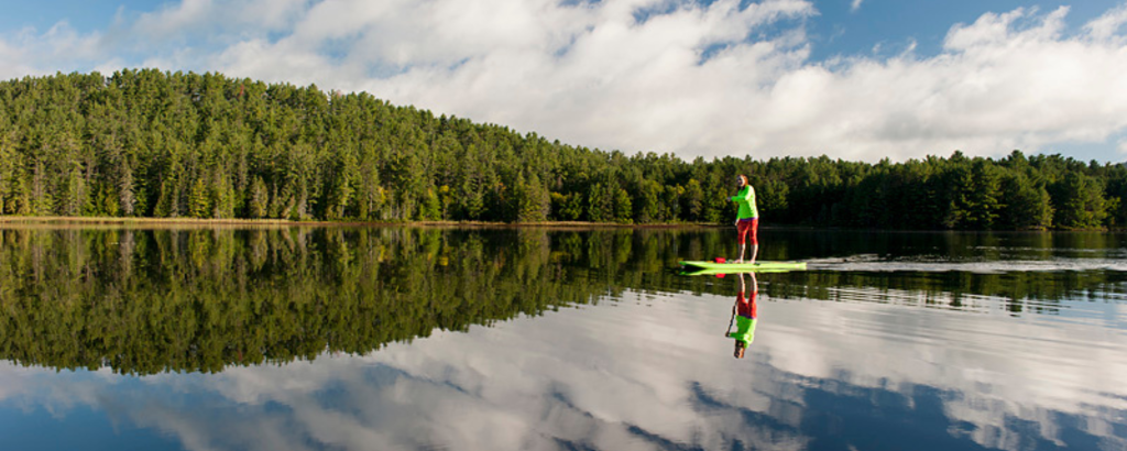 A person paddling a SUP on a body of water