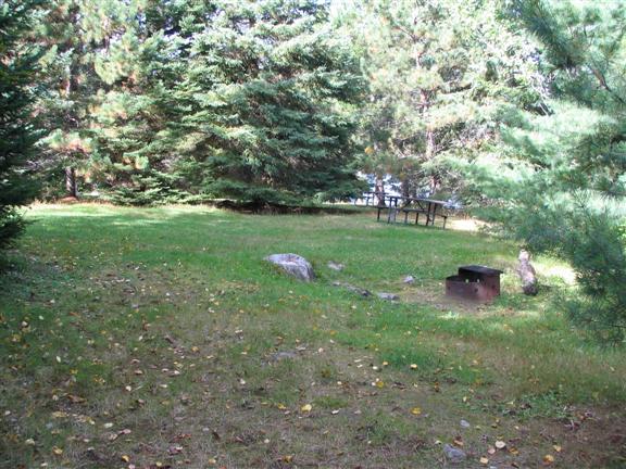 View of site 18. You can see the lake just through the trees.