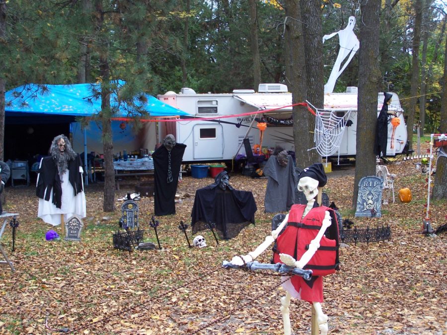 Halloween decorations cover a site. campers really getting into the spirit.