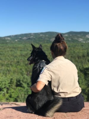 Emma and Mukluk looking out from a lookout.